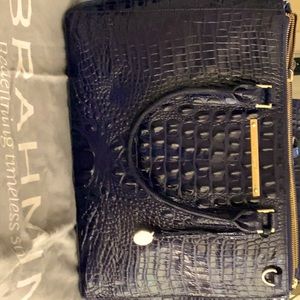 Brahmin Business tote with outside slip and 3 sections-2 with zippers.